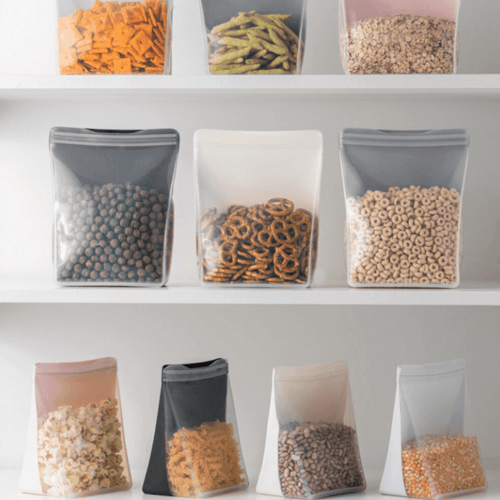 Porter reusable silicone stand-up food storage bag in mint green, 1.5 liter capacity.