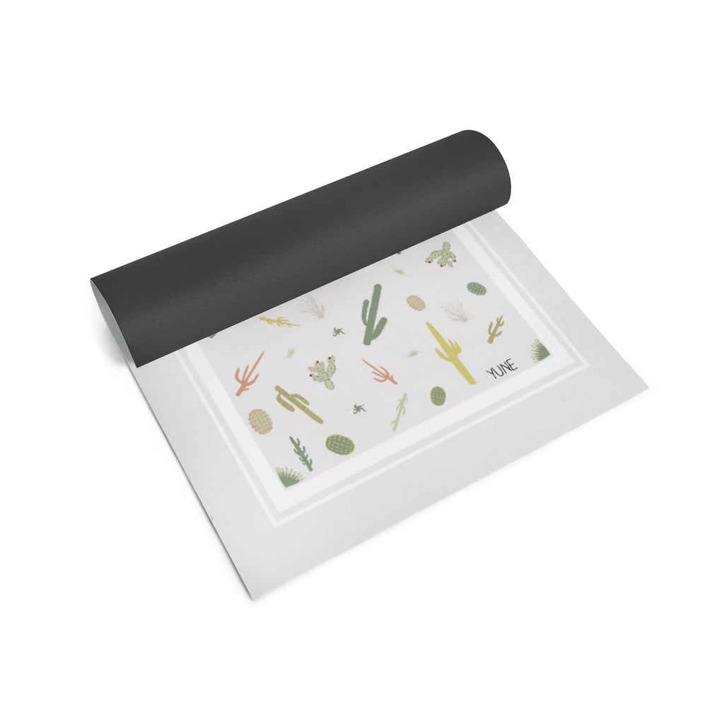 Crisp white Juno yoga mat rolled up, showing 6mm thick eco-friendly non-slip PER texture. — view 3