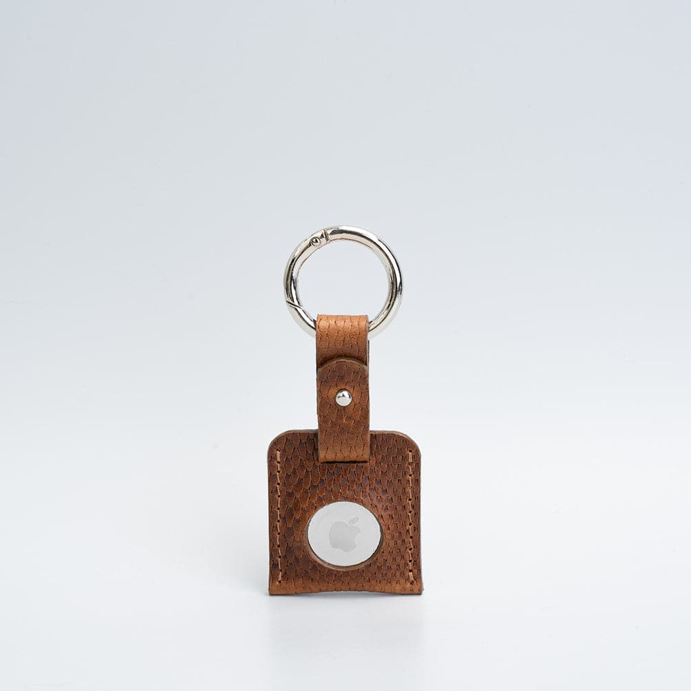 Leather AirTag keychain in premium full-grain leather with a sturdy metal circle carabiner — view 5