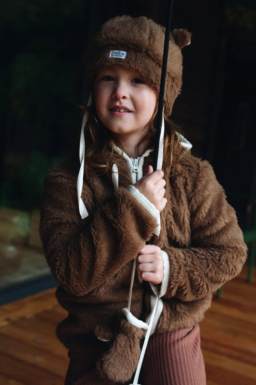 Brown teddy textured woolen baby hat with cute bear ears and long secure tie straps — view 4
