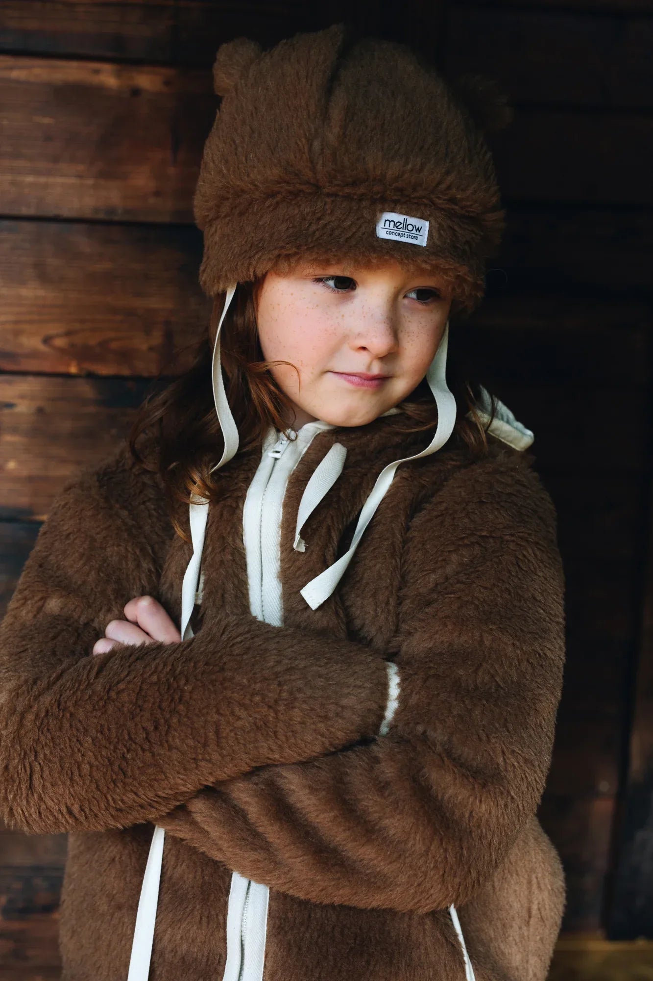 Brown teddy textured woolen baby hat with cute bear ears and long secure tie straps — view 2