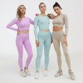 Two piece seamless ribbed yoga set with long sleeve crop top and high waisted leggings