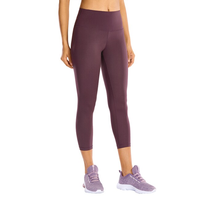 High waisted capri workout leggings offering a supportive calf-length athletic compression fit for women. — view 3