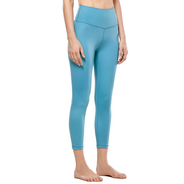 High waisted capri workout leggings offering a supportive calf-length athletic compression fit for women. — view 5