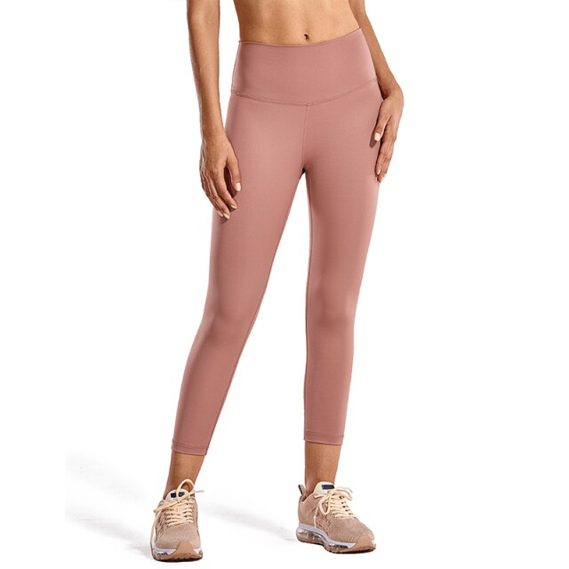 High waisted capri workout leggings offering a supportive calf-length athletic compression fit for women. — view 2