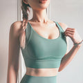 Shock-proof women's yoga sports bra in seamless breathable nylon with a heart-shaped beauty back design.