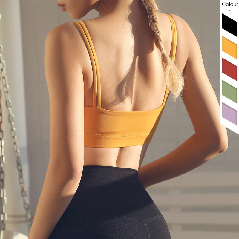 Padded women's double strap yoga sports bra running vest camisole in solid color nylon material