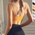 Padded women's double strap yoga sports bra running vest camisole in solid color nylon material