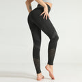 Women's seamless hollow-out fitness leggings with elastic waistband in ankle-length design for yoga and running