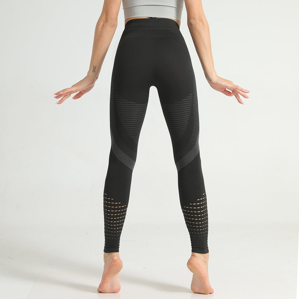 Women's seamless hollow-out fitness leggings with elastic waistband in ankle-length design for yoga and running — view 4