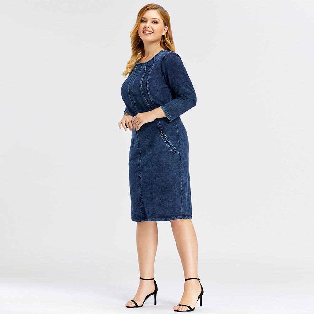 Plus size women's stretch denim sheath dress with three-quarter sleeves and shoulder pads. — view 4
