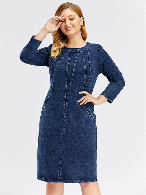 Plus size women's stretch denim sheath dress with three-quarter sleeves and shoulder pads. — view 5