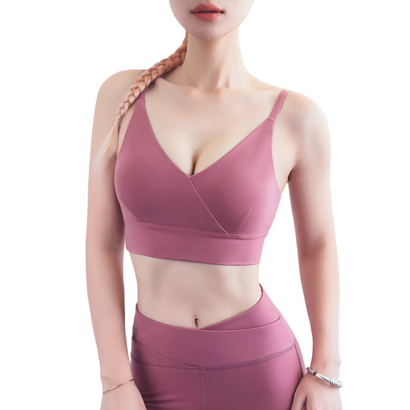 Seamless V-neck sports bra crop top in solid nylon fabric with wide fixed shoulder straps