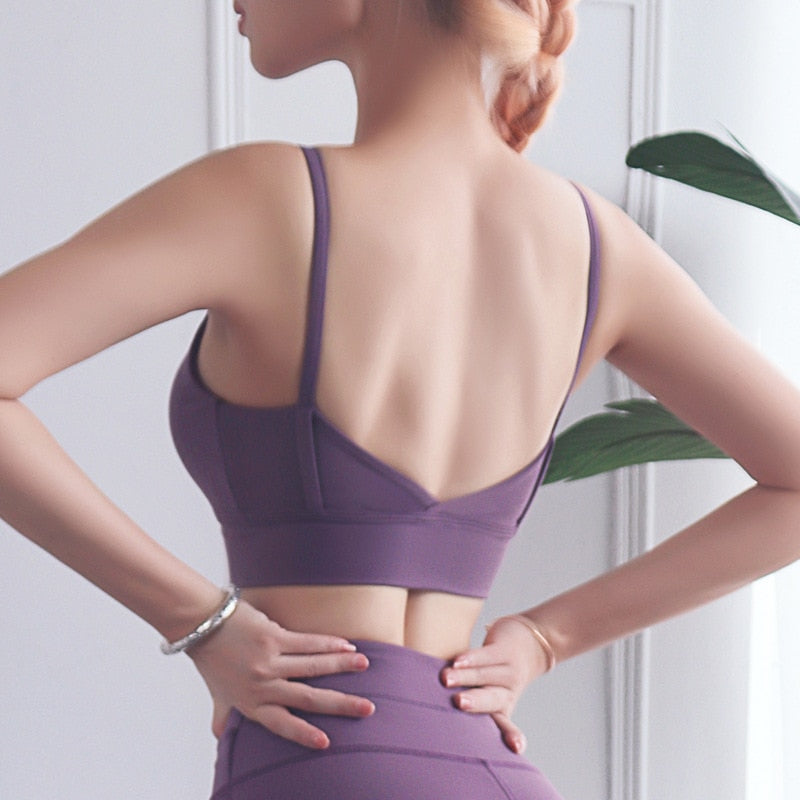 Seamless V-neck sports bra crop top in solid nylon fabric with wide fixed shoulder straps — view 2