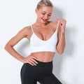 Seamless push-up sports bra crop top with beauty back design in solid colors for running.