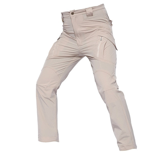 Mens lightweight tactical cargo pants in solid green with multiple utility pockets for outdoor hiking — view 3