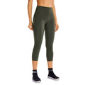 High waisted capri workout leggings offering a supportive calf-length athletic compression fit for women.