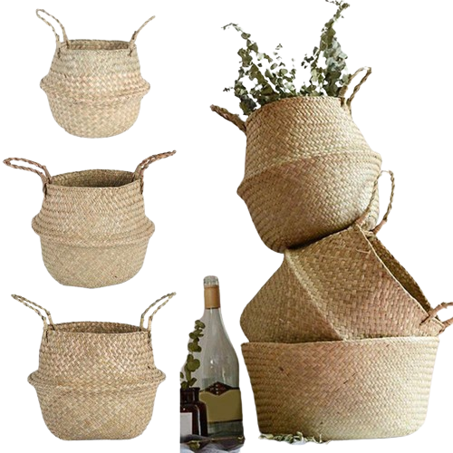 Handmade natural seagrass storage basket with sturdy handles functioning as a woven plant pot cover