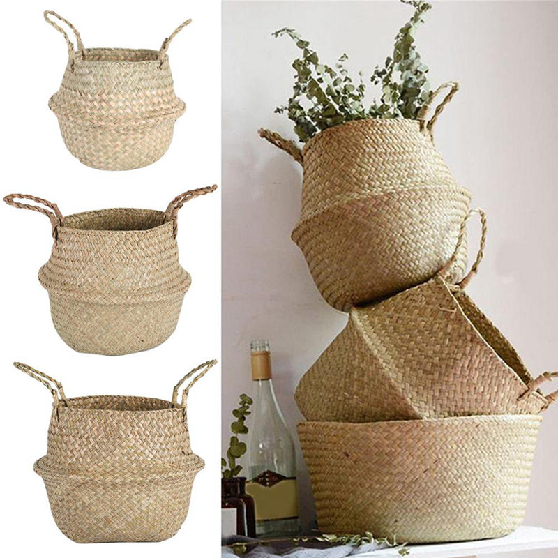 Handmade natural seagrass storage basket with sturdy handles functioning as a woven plant pot cover — view 2