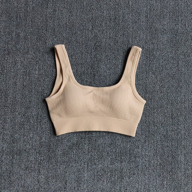 Seamless women's nylon sports bra crop top in various earthy colors with push up padding — view 2