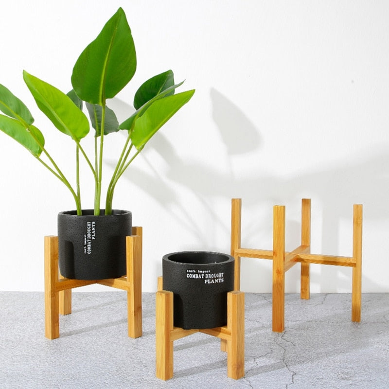 Small four-legged wooden plant stand base designed for holding indoor succulent and flower pots — view 2