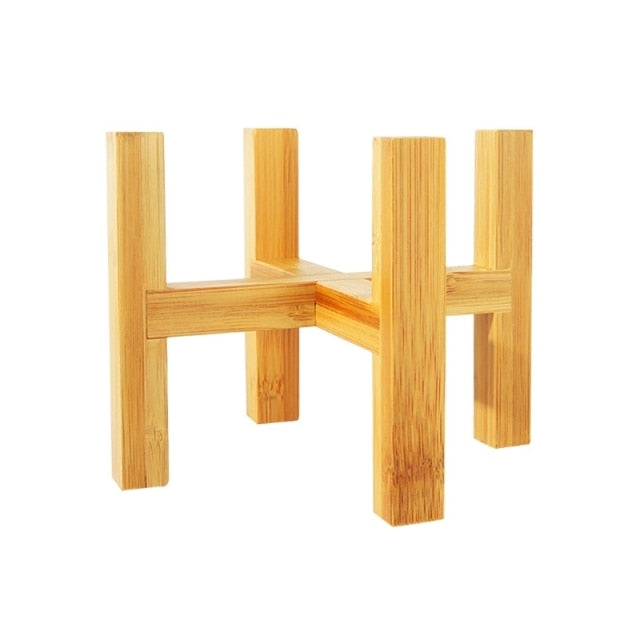 Small four-legged wooden plant stand base designed for holding indoor succulent and flower pots