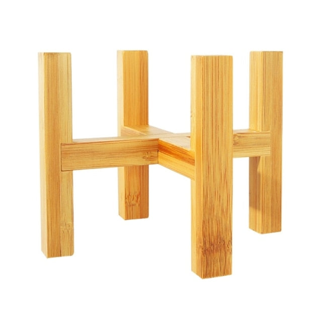 Small four-legged wooden plant stand base designed for holding indoor succulent and flower pots — view 4