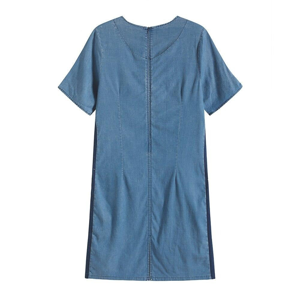 Plus size printed denim dress with V-neck, three-quarter sleeves, and front pockets. — view 2