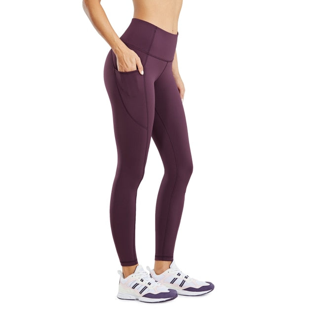 Women's compression training leggings with side pockets and high waist tummy control in solid color — view 5