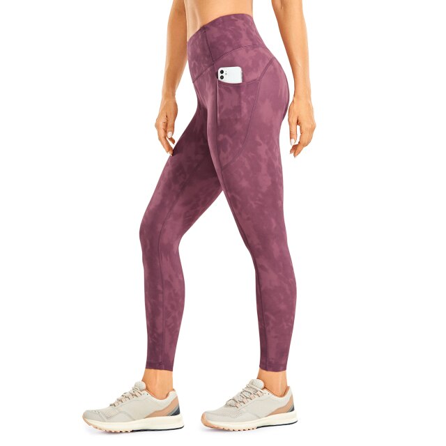 Women's compression training leggings with side pockets and high waist tummy control in solid color — view 4