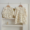 Baby girl lace collar bodysuit and floral pattern dress in pink and beige cotton blend
