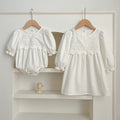 White and ivory lace trim baby girl bodysuit and sister matching floral dress set