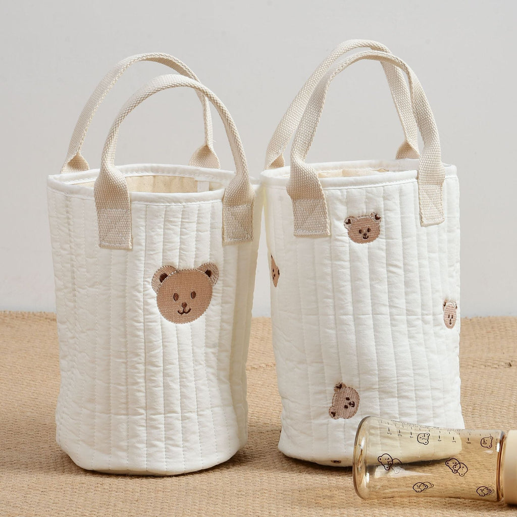 Embroidered cotton mommy handbag with adjustable straps and multiple baby bottle storage compartments. — view 2