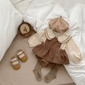 Baby girl solid color doll neck shirt strap cotton bodysuit in khaki and brown