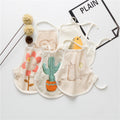 Lightweight cotton baby apron bib with adjustable belt and colorful printed patterns for summer feeding.