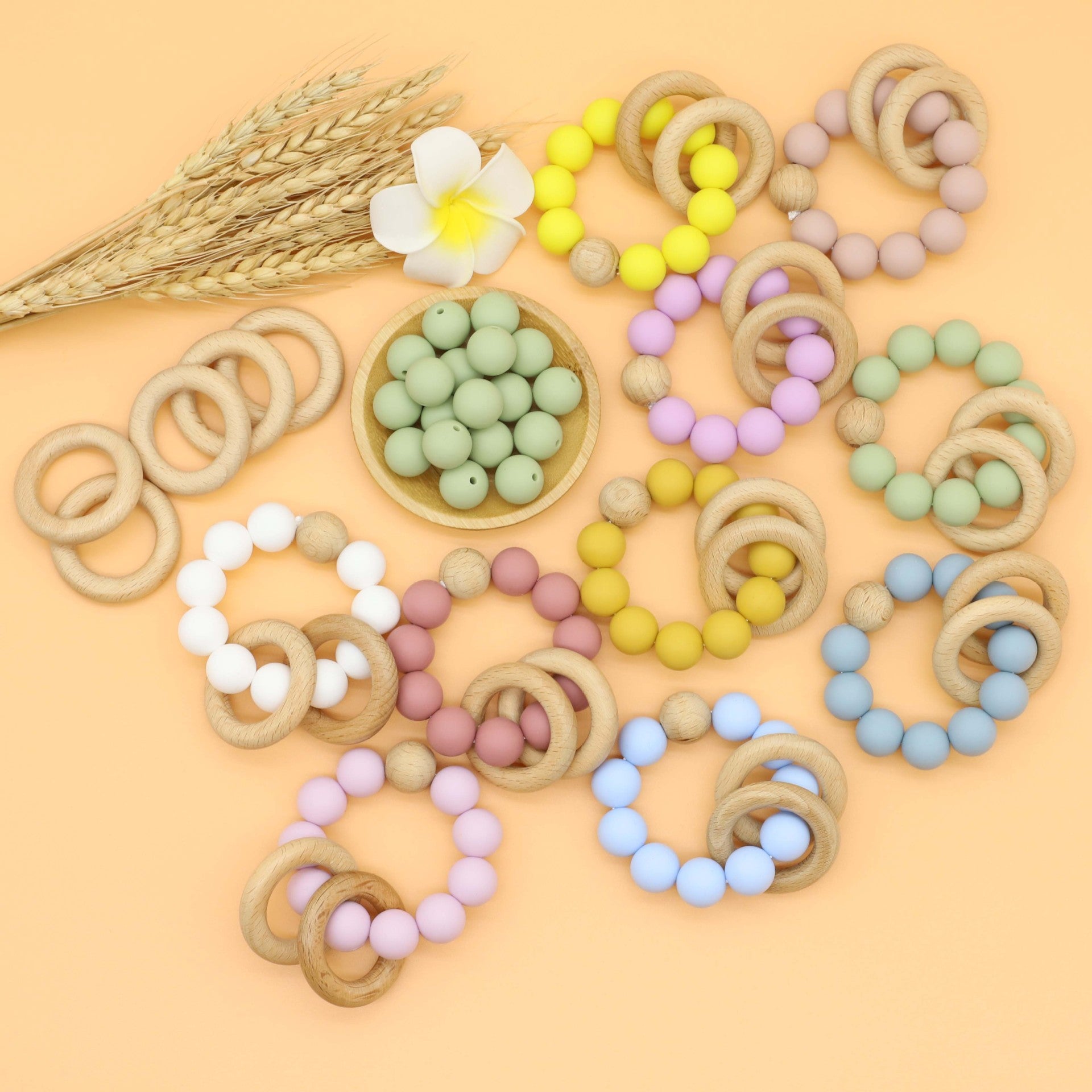 Multicolor silicone baby teether chain toy in bright rainbow colors for soothing gum relief.