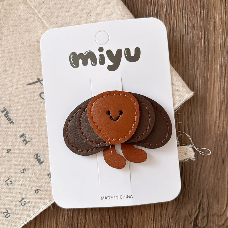 Adorable kids leather hair clip with colorful cartoon design for toddlers and young girls — view 5