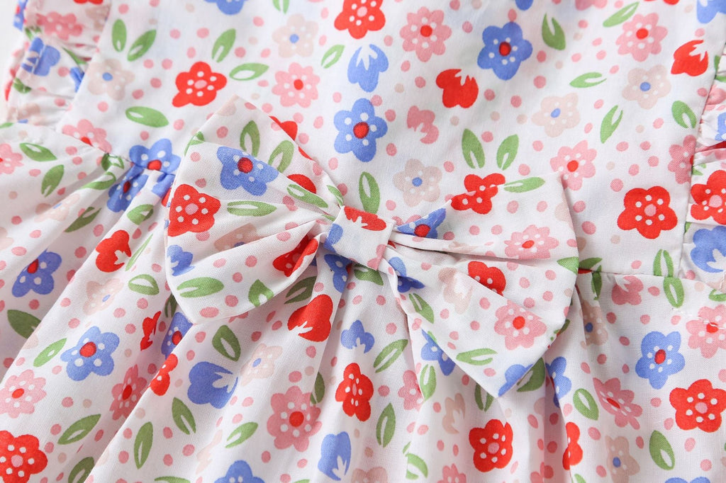 Pink floral baby girl sleeveless bodysuit dress with bow tie detail and round collar — view 2