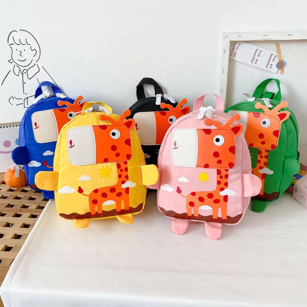 Kids Oxford cloth backpack with vibrant cartoon animal pattern and adjustable shoulder straps — view 2