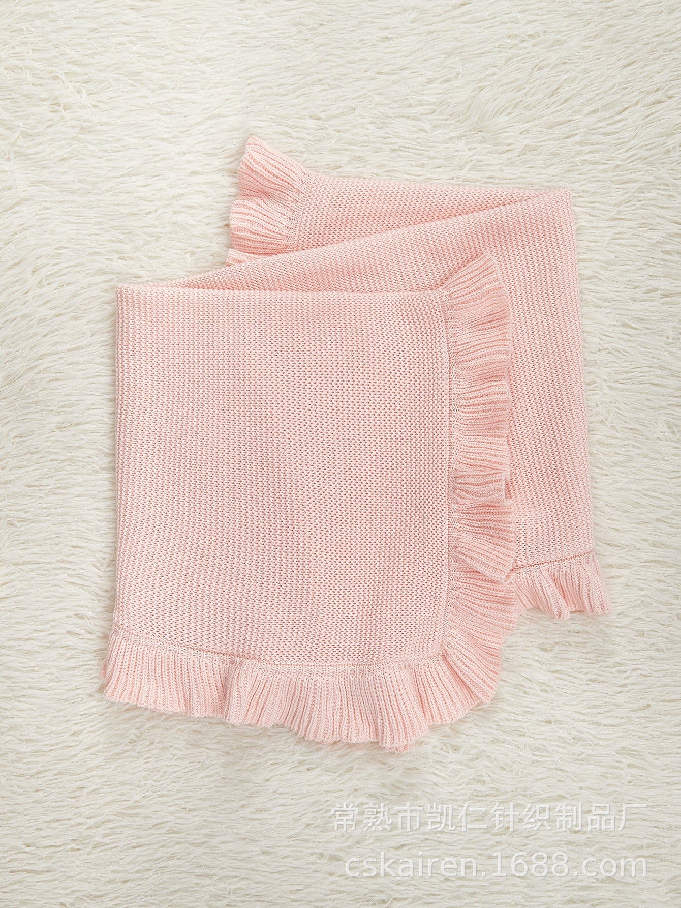 Solid color pure cotton knitted baby blanket featuring an elegant ruffle trim for stylish nursery decor