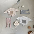 Baby girl striped pattern newborn bodysuit with a large front pocket in soft breathable cotton fabric
