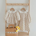 Floral baby doll collar dress set in pink and beige cotton blend for toddler