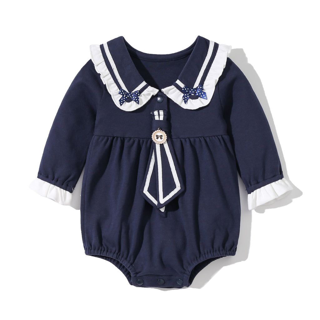 Baby girl sailor bodysuit in white and navy blue with a playful tie-dye patched design — view 2