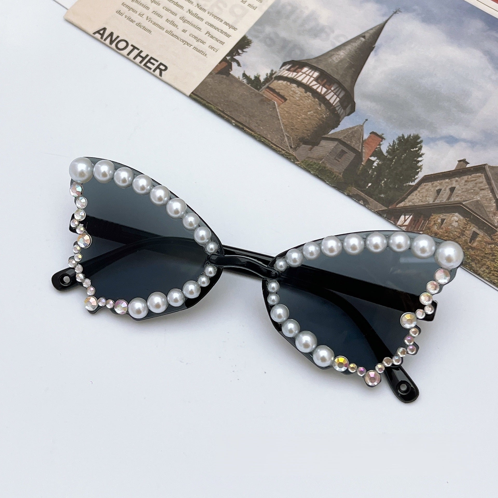 Trendy pearl butterfly sunglasses for girls featuring UV protection lenses and a lightweight elegant frame — view 2