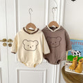Unisex baby hooded bodysuit in beige cotton with a cute teddy bear pattern