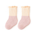 Baby unisex ruffle fringe crew socks in colorful patchwork design made of soft cotton blend