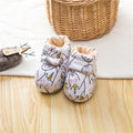 Animal print baby booties in white cotton with soft winter fleece lining