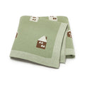 Soft cotton knitted baby blanket featuring a charming little house pattern for newborn nursery decor