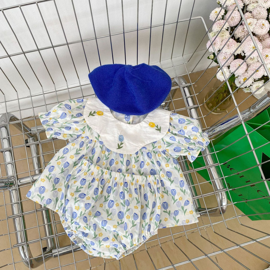 Blue cotton baby clothing set with floral embroidered doll neck top and matching shorts — view 2