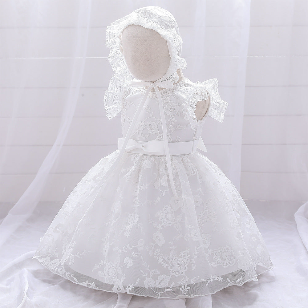 Baby girl formal dress in white or red with mesh overlay and matching hat — view 3